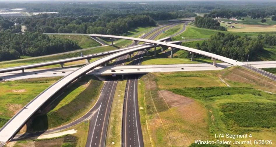 Image from Winston-Salem Journal video above the nearly completed I-40/I-74 
	 Beltway interchange after the official ribbon cutting ceremony, August 2026