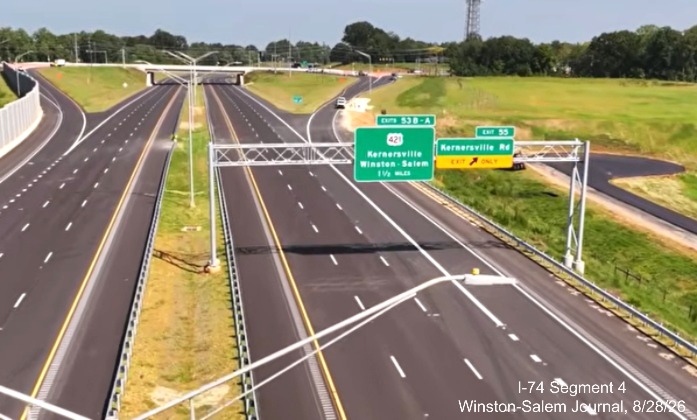 Image from Winston-Salem Journal video above the nearly completed Kernersville 
	 Road interchange showing overhead signage, August 2026