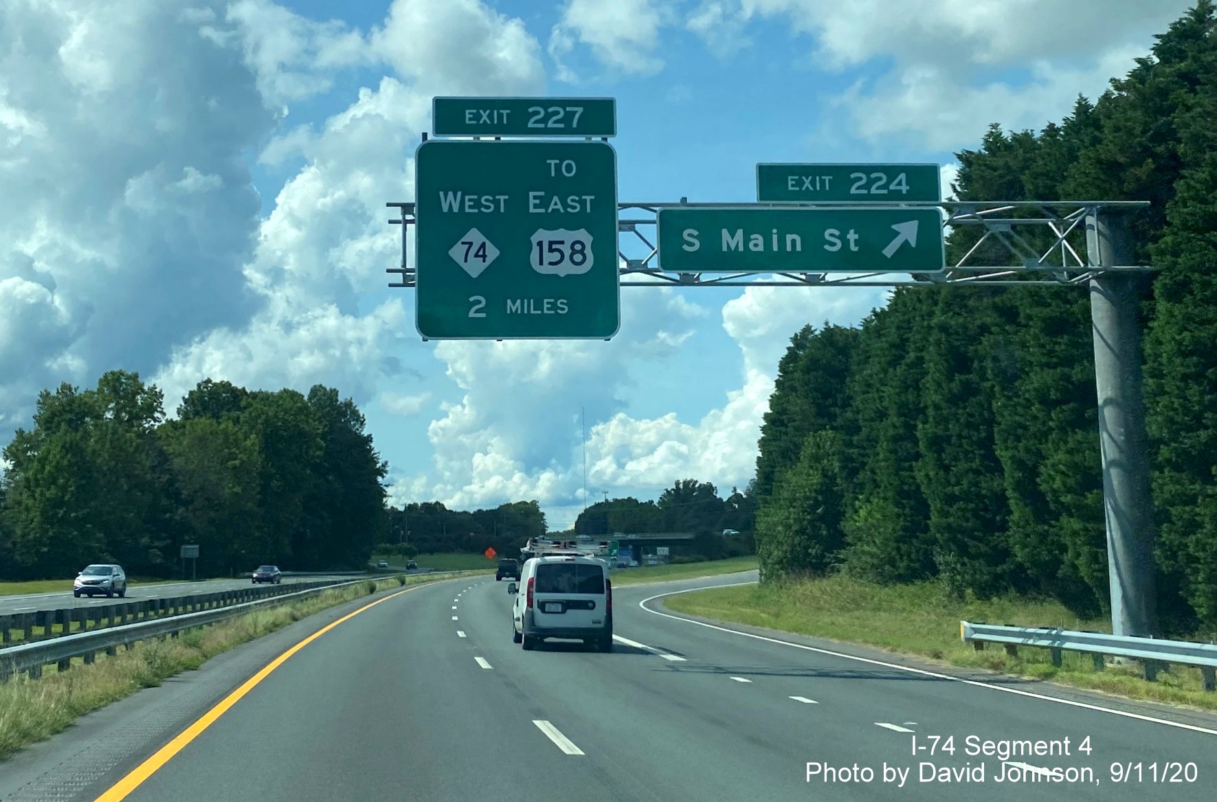 Image of newly uncovered 2 miles advance sign for NC 74 West Winston Salem Northern Beltway on US 421 North, by David Johnson September 2020