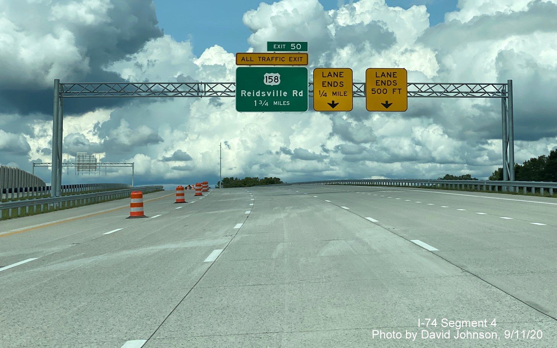 Image of first overhead sign gantry with 1 3/4 mile advance sign for US 158 on NC 74 (Future I-74) West Winston Salem Northern Beltway, by David Johnson September 2020