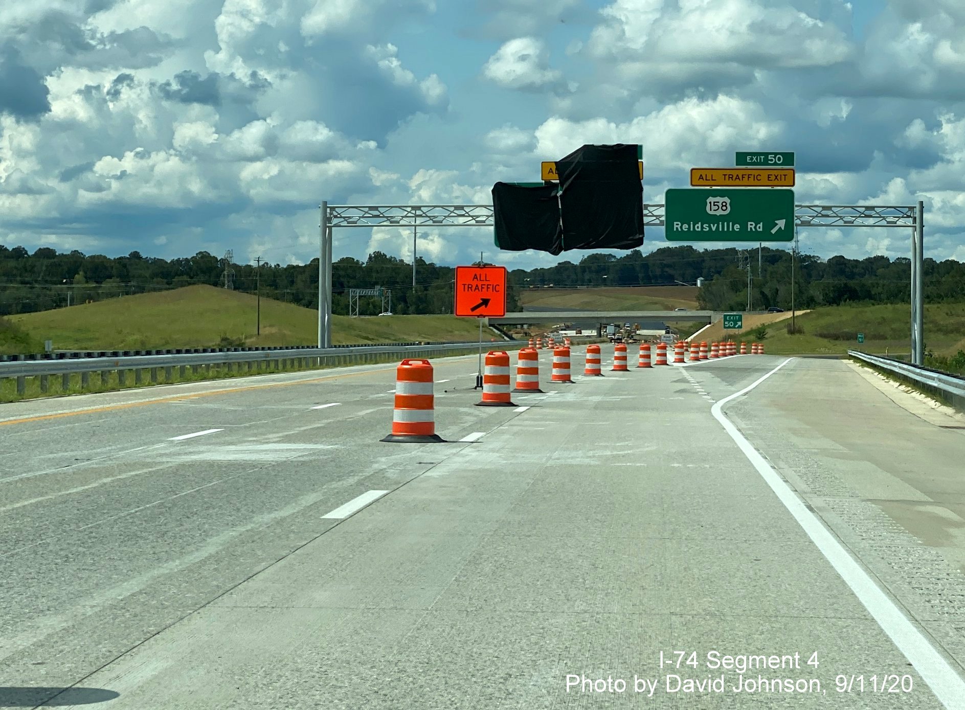 Image of overhead exit signage at current end of NC 74 (Future I-74) West Winston Salem Northern Beltway, by David Johnson September 2020