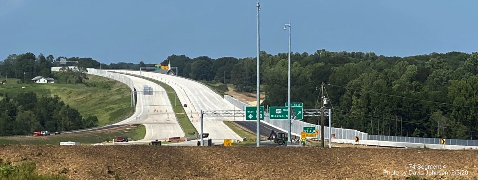 Image of overhead signs at soon to open interchange between NC 74 West/Winston Salem Northern Beltway and US 421 Salem Parkway, by David Johnson, September 2020