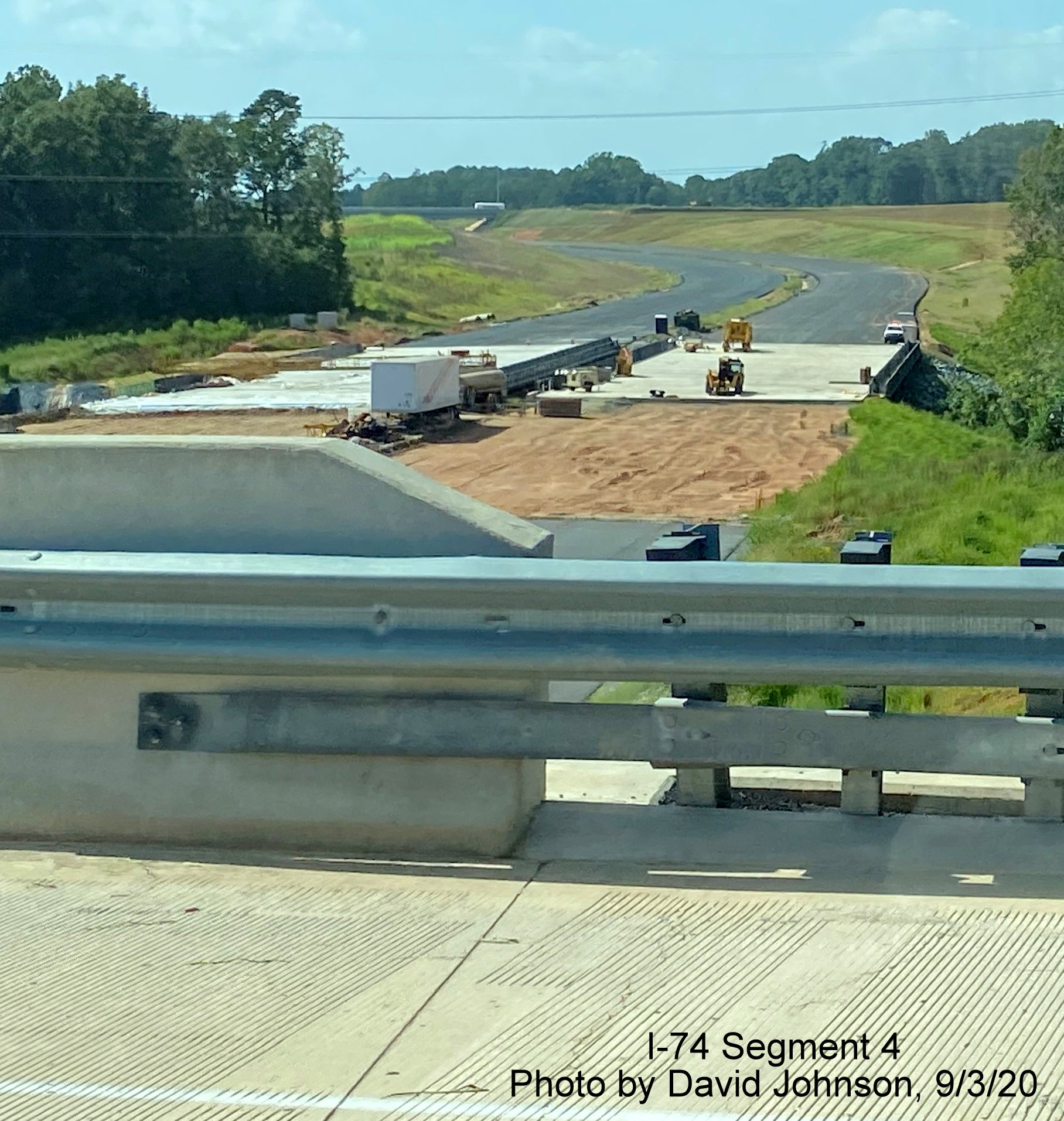 Image of NC 74 Winston Salem Northern Beltway still under construction looking west from US 158 
        bridge, by David Johnson September 2020