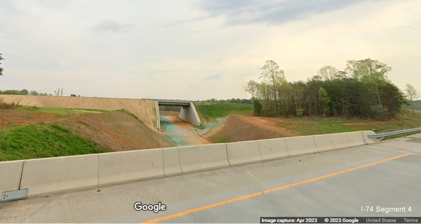 Image of future US 52 North lanes near completion and bridge over future Northern Beltway ramp, 
        Google Maps Street View image, April 2023
