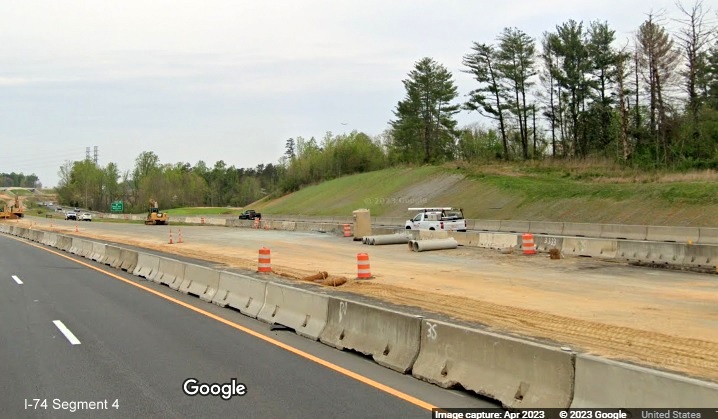 Image of from US 52 South lanes of future exit ramp to Winston-Salem Northern Beltway from US 52 North, 
        Google Maps Street View image, April 2023