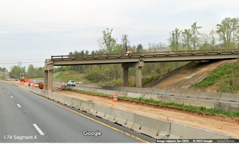 Image of US 52 North lanes passing under partially demolished Ziglar Road bridge at start of Northern 
        Beltway interchange work zone, Google Maps Street View image, April 2023