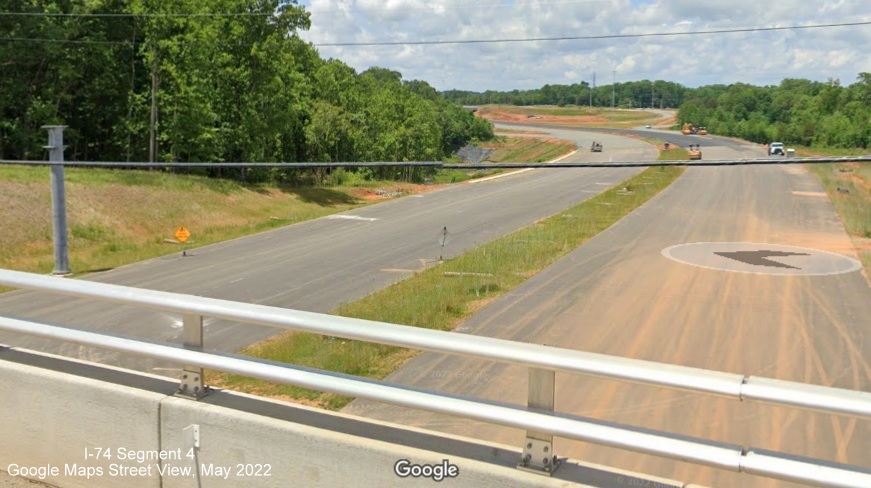 Image looking west from Stanleyville Drive toward future I-74/Winston Salem Northern Beltway 
                                            interchange with NC 66/University Parkway, Google Maps Street View, May 2022