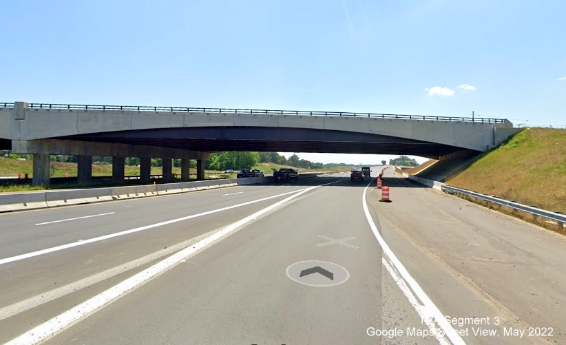 Image of enter US 52 from new NC 65 on-ramp prior to bridge heading toward future Beltway interchange, Google Maps Street 
        View, May 2022