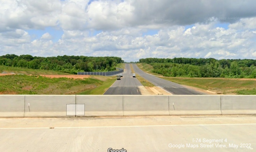 Image of view looking west from NC 8/Germanton Road bridge at future I-74 East/Winston-Salem 
        Northern Beltway, Google Maps Street View, May 2022