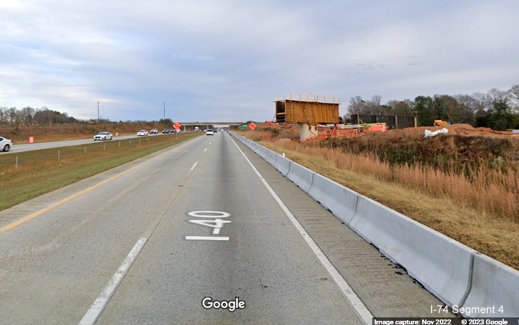 Image of bridge support under construction along I-40 East lanes for future interchange with I-74/Winston-Salem 
       Northern Beltway in Forsyth County, Google Maps Street View, November 2022