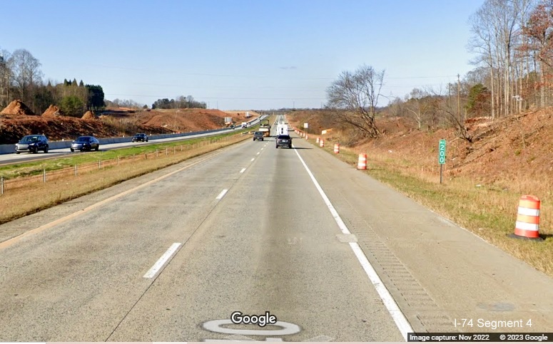 Image of clearing and grading along I-40 West lanes after Union Cross Road for future interchange with I-74/Winston-Salem 
       Northern Beltway in Forsyth County, Google Maps Street View, November 2022