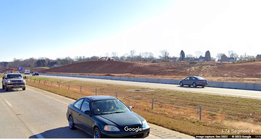 Image of clearing and grading along I-40 West lanes for future interchange with I-74/Winston-Salem 
       Northern Beltway in Forsyth County, Google Maps Street View, December 2022