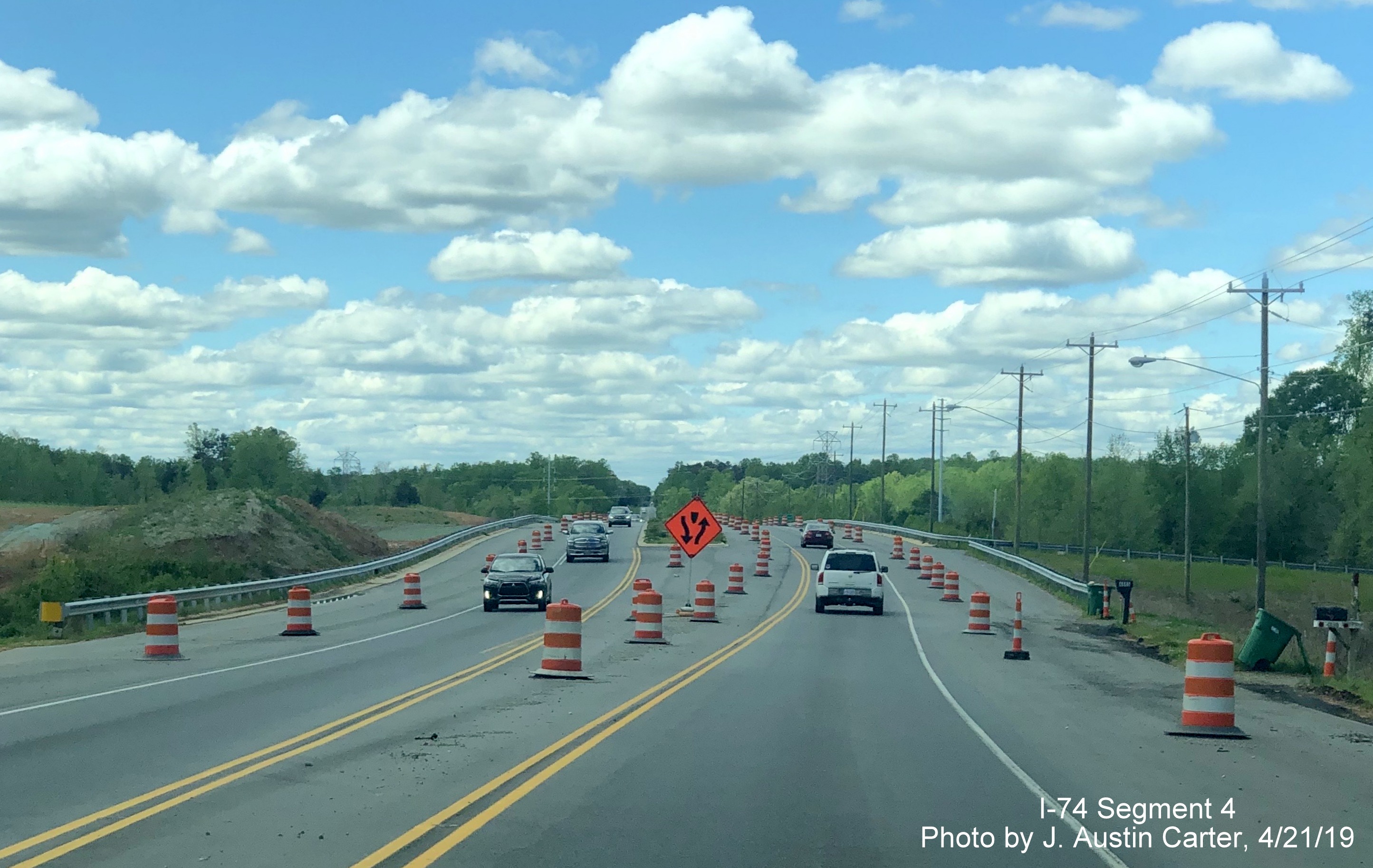 Image of traffic on US 158 West using new bridge over Future I-74/Winston-Salem Northern Beltway, by J. Austin Carter