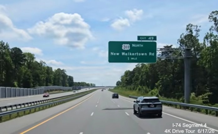 Image of 1 mile advance sign for New Walkertown Road exit now the North added
	  next to the US 311 shield on NC 74 East, screen grab from 4K Drive Tour video, June 17, 2026