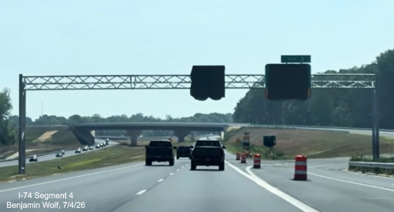 Image of new overhead signage at the future I-74 West Beltway exit ramp
	 covered up, screen grab from Benjamin Wolf video, July 4, 2026