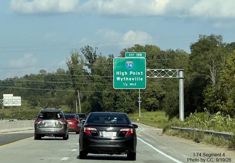 Image of uncovered 1/2 Mile advance overhead sign for newly opened I-74 / Winston
	 Salem Northern Beltway exit on I-40 East, photo by CC, September 2026