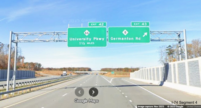 Image of overhead signage at NC 8 exit on NC 74 West/Winston-Salem
	  Northern Beltway showing supports remain for removed yellow All Traffic Exit tab, Google Maps Street View, November 2025