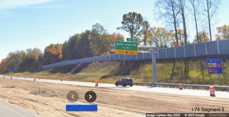 Image of new overhead 1/2 mile advance sign for Union Cross Road exit on
	  I-74 East, Google Maps Street View, November 2025