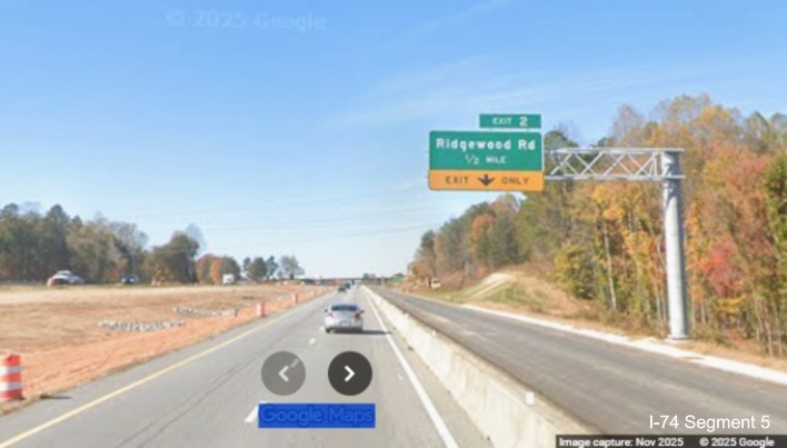 Image of new 1/2 mile advance overhead sign for the Ridgewood Road exit with new
	  NC 192 milepost exit number, Google Maps Street View, November 2025