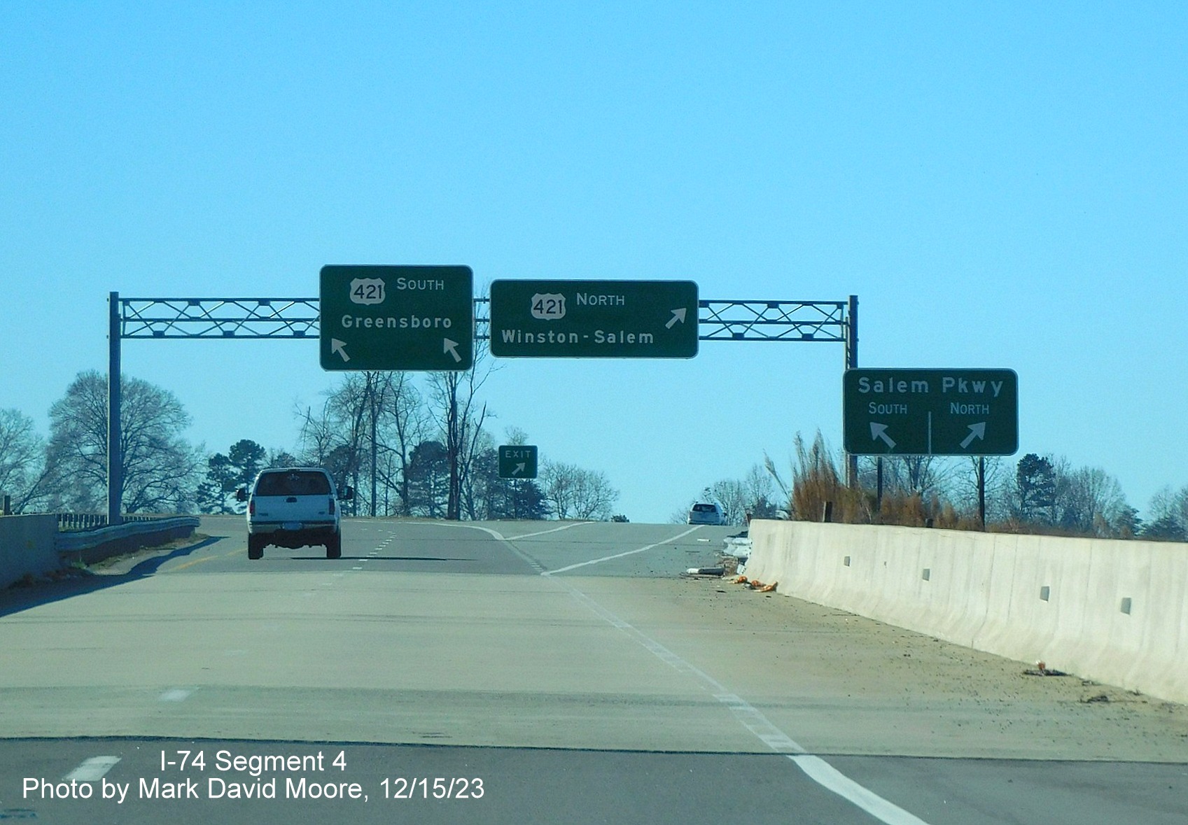 Image of overhead signs on C/D ramp for US 421 exits at current end of NC 74 (Future I-74) East/
        Winston-Salem Northern Beltway, by Mark David Moore, December 2023