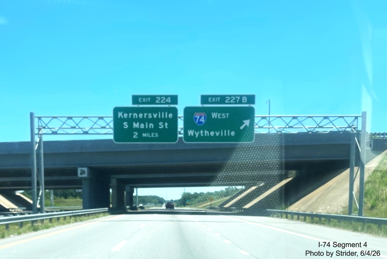 Image of new I-74 shield on overhead ramp sign at the Beltway interchange on US 421 
	  East, photo by Strider, June 2026