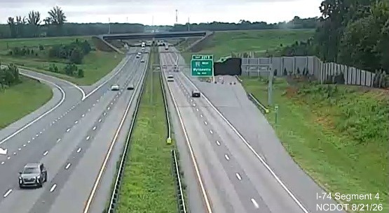 NCDOT traffic camera image of future I-74 East ramp still without new pavement
	 markings as seen from US 421 South/Salem Parkway, August 21, 2026