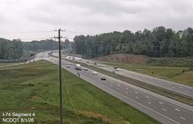 NCDOT traffic camera image of new I-74 mile markers, covered up on I-74 at the
	 NC 8 exit, August 1, 2026