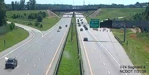 NCDOT traffic camera image on US 421 showing lack of progress painting lines at the
	 future East I-74 exit ramp, July 31, 2026