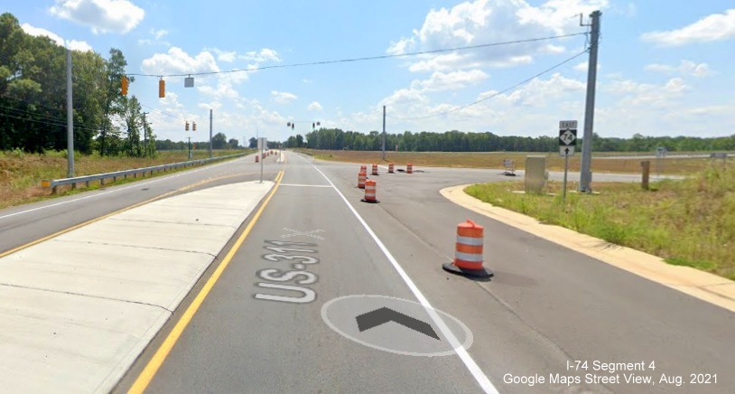 Future ramp to NC 74/Winston-Salem Northern Beltway ramp blocked by traffic barrels, 
        Google Maps Street View, August 2021