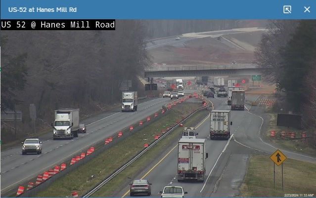 NCDOT traffic camera image of US 52 looking north from Hanes Mill Road towards Winston-Salem Northern Beltway interchange, February 2024