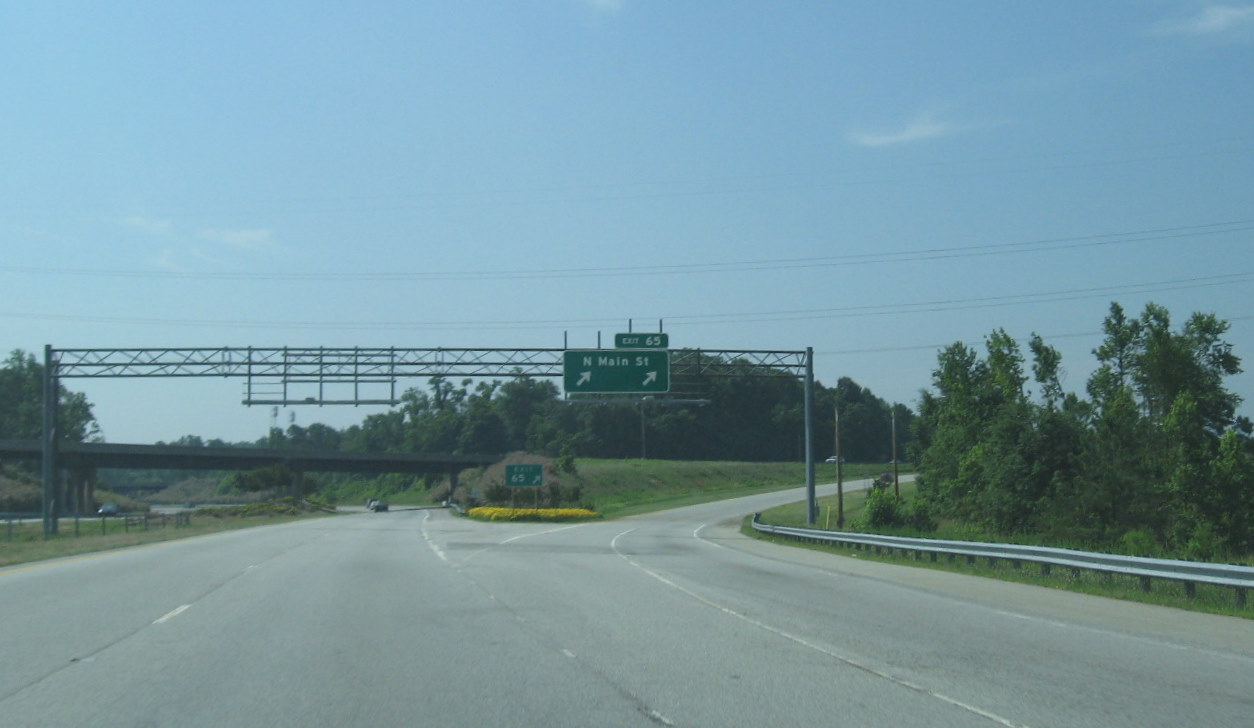 Photo of signage at Main St on I-74 East after tornado in the spring of 
2010