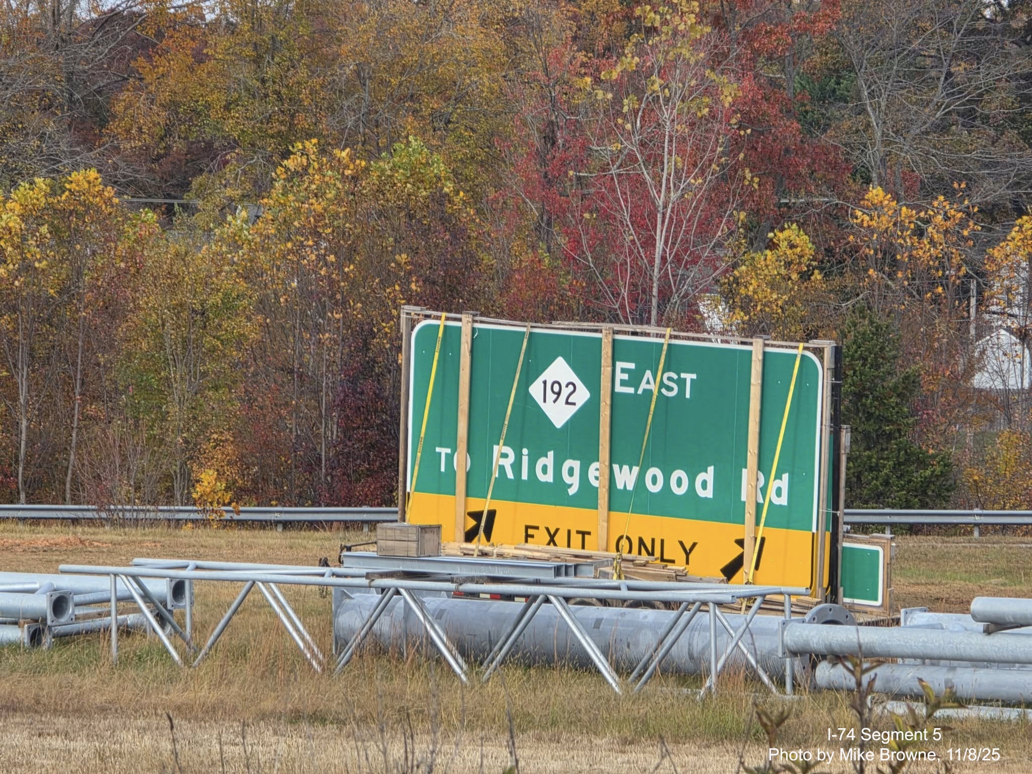 Image of Future NC 192 exit signs stored along Union Cross Road at the I-74 ramps,
photo by Mike Browne, November 2025
