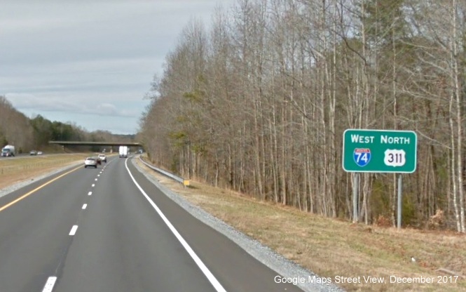 Image of West I-74/North US 311 reassurance marker sign following NC 66 Kernersville exit, 
        Google Maps Street View image taken in January 2017