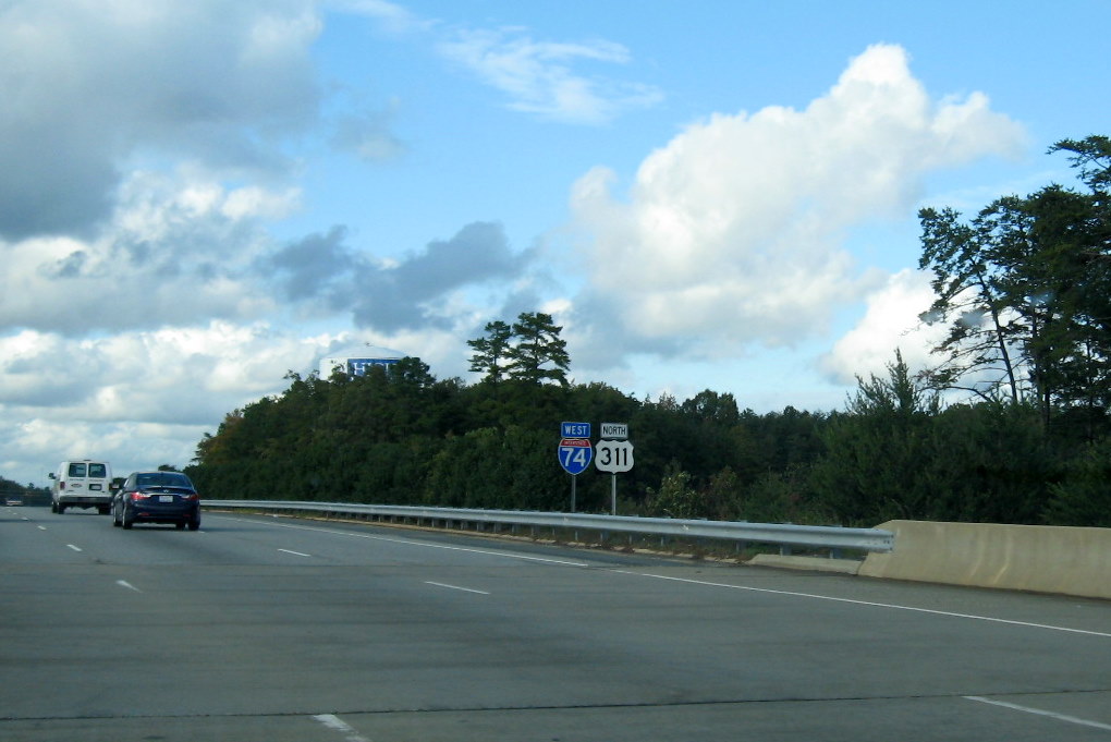 Photo of I-74 and US 311 shields along the East Belt Freeway near Kivett Dr 
in Oct. 2011