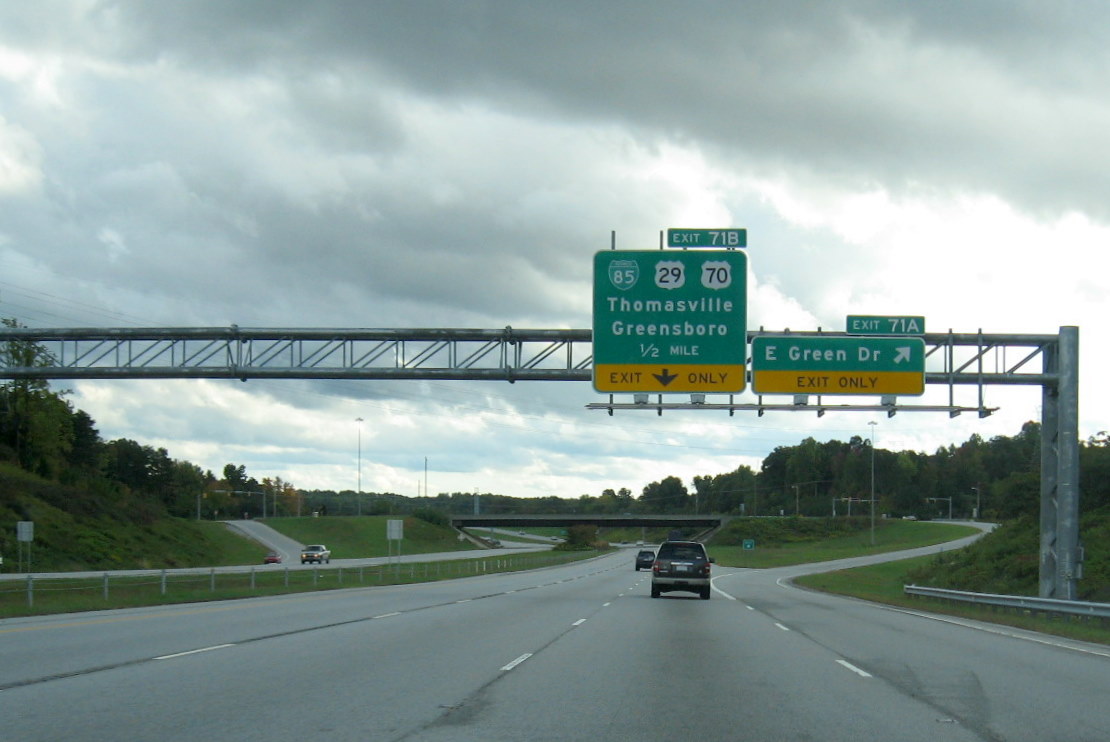 Photo of signage for Business 85 exit on now completed High Point East Belt 
freeway in Oct. 2011