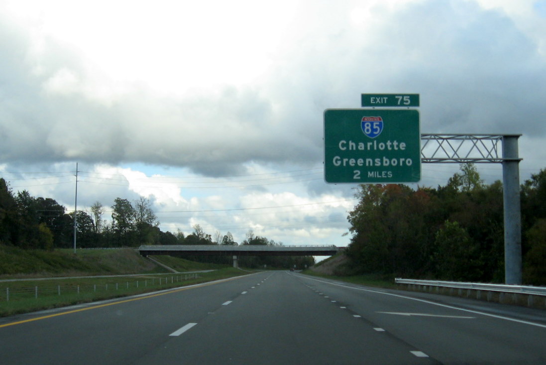 Photo of I-85 exit sign approaching Baker Rd Bridge on I-74 East in Oct. 2011