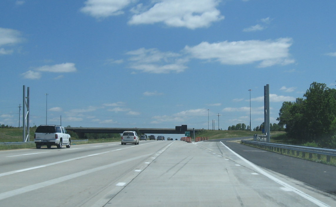 Photo of some of the first signs being placed on I-85 North for the I-74 
interchange in May 2010