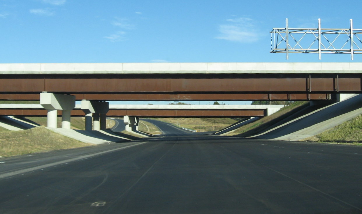 Photo taken traveling under the I-85 bridge along the unopened I-74 
freeway in Oct. 2010