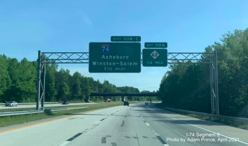 Image of 1 1/2 miles advance sign for I-74 exits without US 311 shield after decommissioning on I-85 
                                               North in High Point, by Adam Prince, April 2021