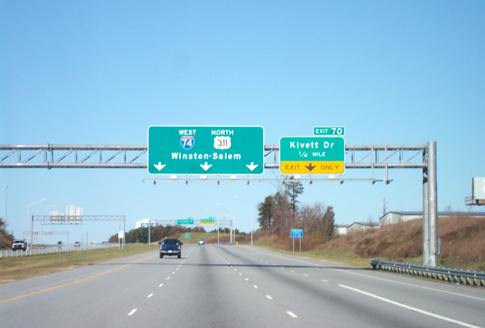 Photo of new route signage at the Kivett Drive exit in Nov. 2010, 
Courtesy of Adam Prince