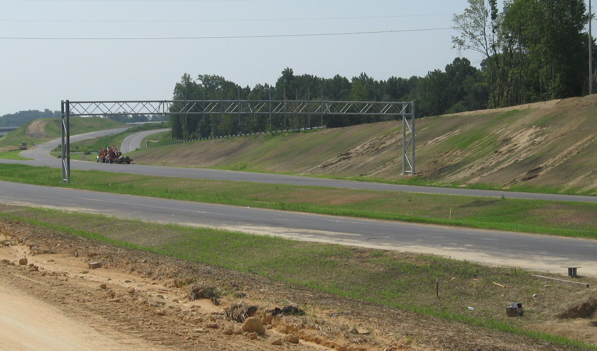 Photo of newly installed supports for I-85 exit signage fromm Dresden Road 
in July 2010