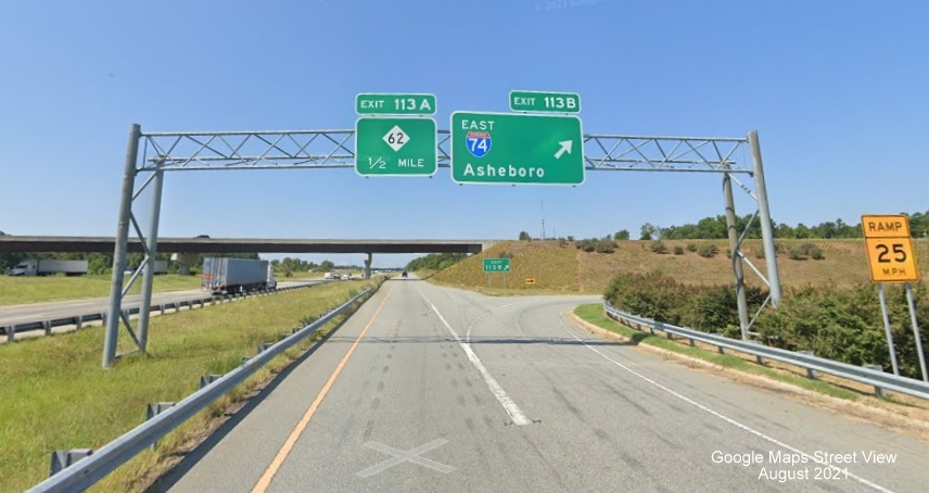Overhead signage on C/D ramp from I-85 South for I-74 East exit with US 311 shield removed, Google Maps Street View 
        image, August 2021