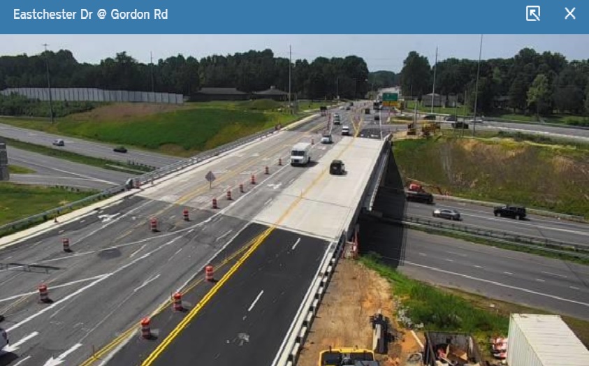 NCDOT traffic camera image showing new westbound section of future US 70 bridge over I-74 in 
                                                High Point open to traffic, August 2021