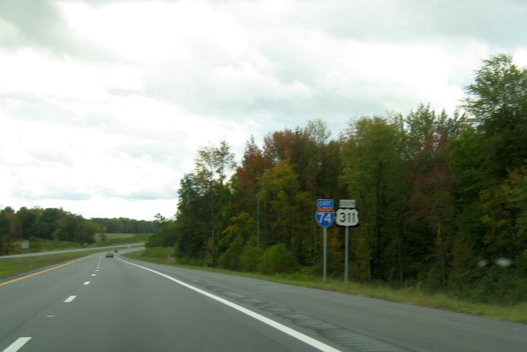 Photo of first East I-74/South US 311 reassurance markers following on-ramp 
from Interstate 85 North on Open I-74 Freeway south of High Point in October 2011