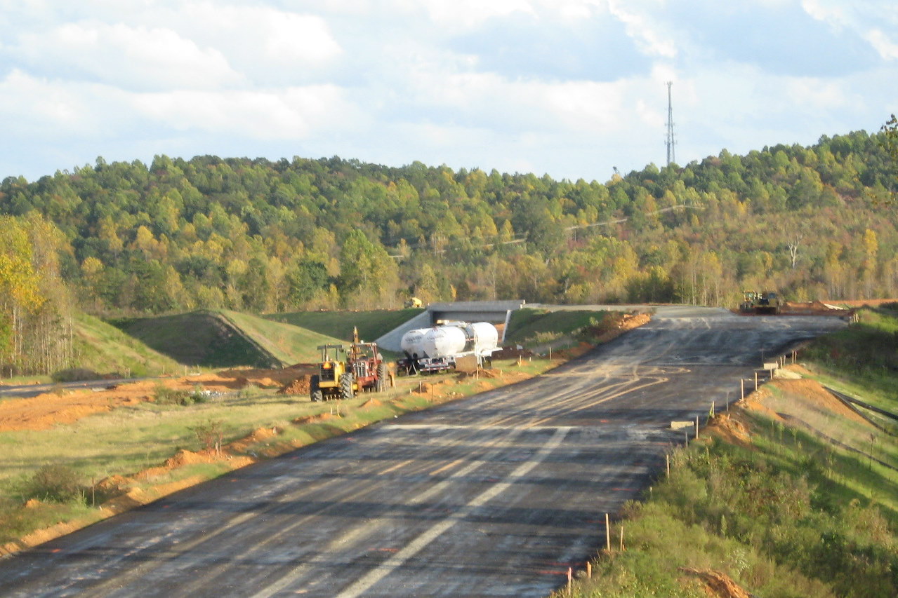 Photo of view south of Heath Dairy Road Bridge showing progress in placing 
pavement for future I-74 freeway near Randleman, Oct. 2011
