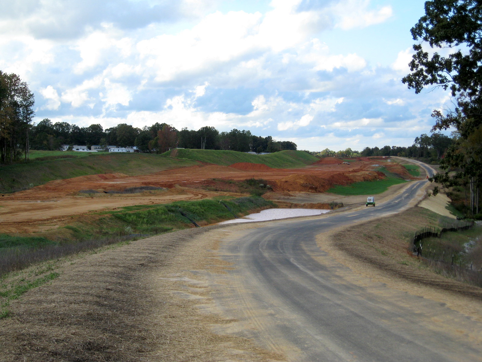 Photo looking northwest from Branson Davis Rd showing construction of access 
road paralleling I-74 freeway