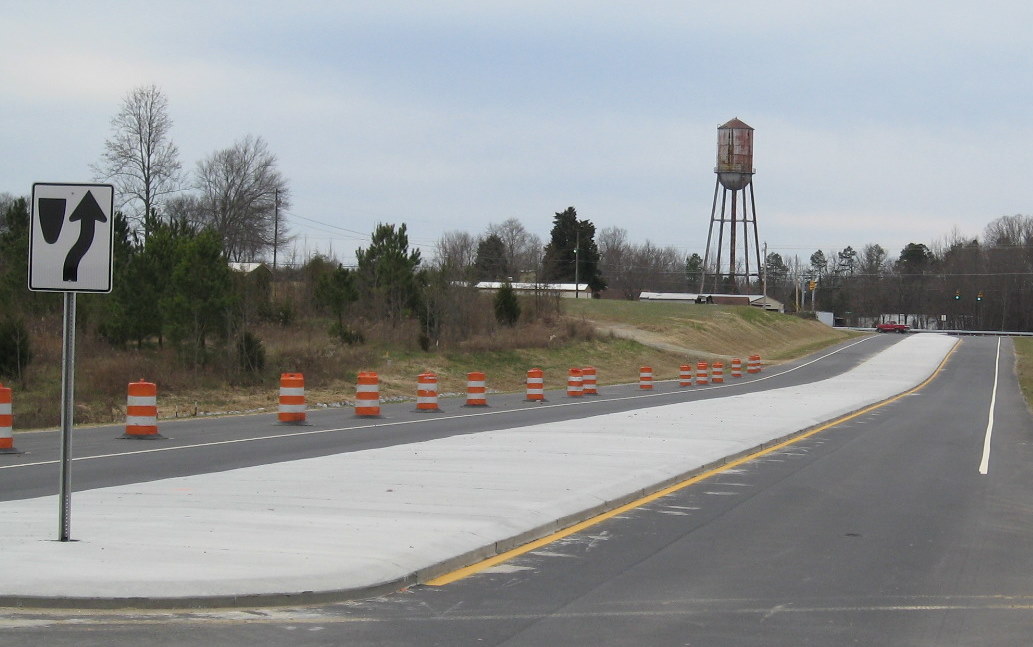 Photo of Cedar Square Road looking west from I-74 freeway toward existing 
US 311 near Glenola, Dec. 2009