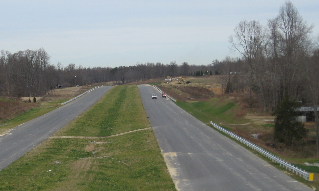 Photo of view north and west from Tuttle Rd Bridge showing I-74 construction 
progress in Dec. 2009
