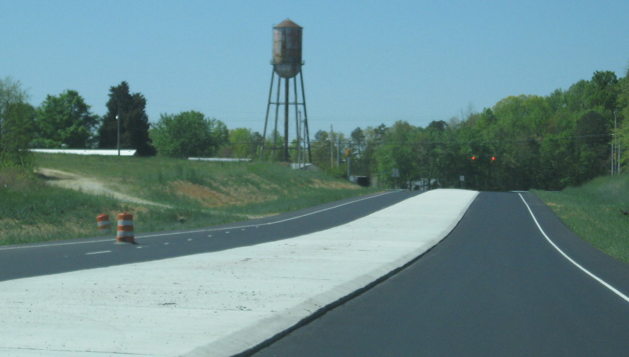 Photo of new alignment of Cedar Square Rd from future I-74 freeway to 
current US 311, Apr. 2010