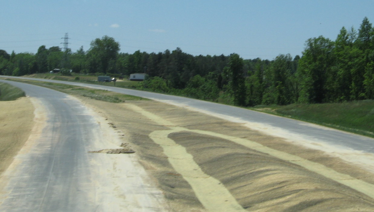 Photo of construction progress south of Poole Road bridge over I-74 Freeway, 
May 2010